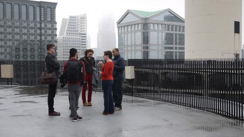 Field Trip / Field Notes/ Field Guide Fellows asking questions of Nicol Chervenak, an architect and Marina City resident, on the roof of the west tower of Marina City. Field Trip / Field Notes/ Field Guide Fellows asking questions of Nicol Chervenak, an architect and Marina City resident, on the roof of the west tower of Marina City.